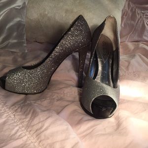 Guess women’s sparkling silver heels